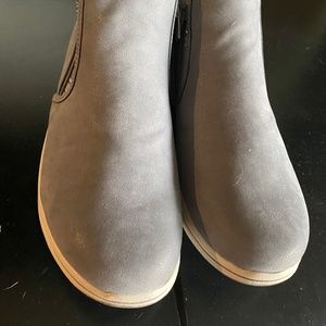 These shoes look great with jeans.  The material is like a smooth suede.